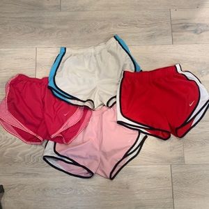 4 pairs of Nike Tempo athletic shorts